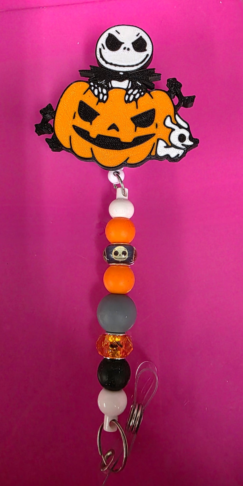 BEADED BADGE REEL- PUMPKIN KING