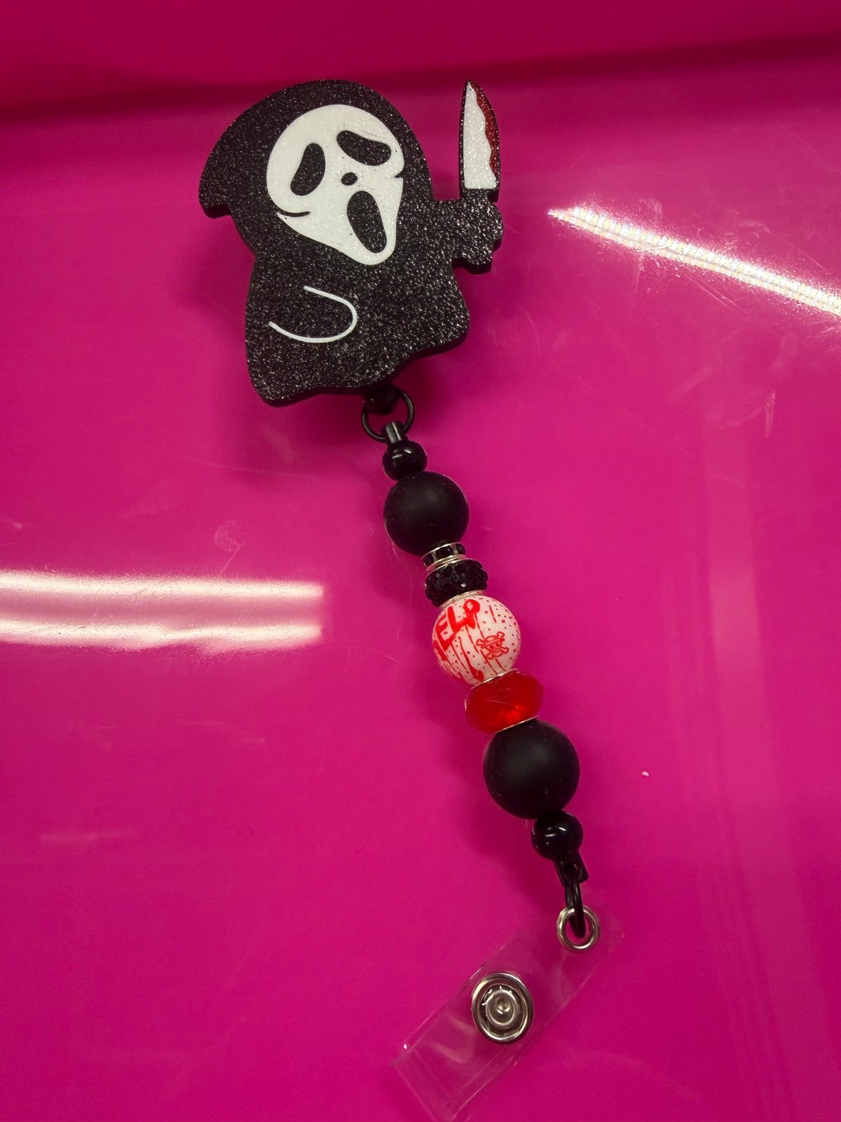 BEADED BADGE REEL GF KNIFE